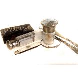 A double end silver mounted glass perfume bottle, marked London 1880, together with two other silver