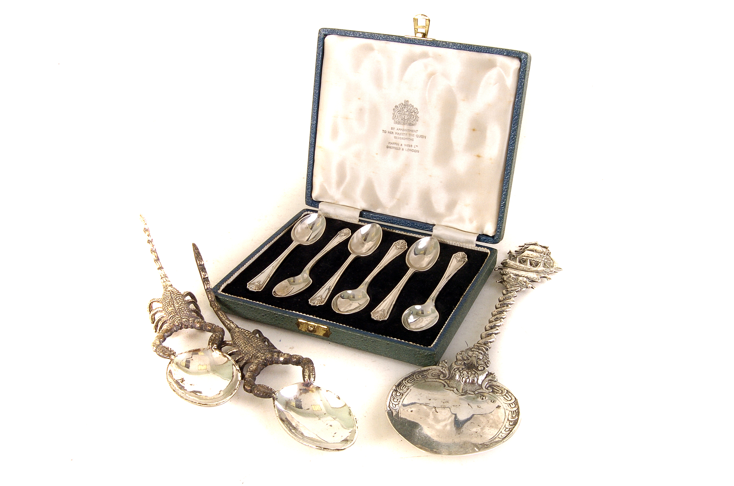 A set of six Elizabeth II silver tea spoons, marked Sheffield 1966, by Mappin & Webb,  together with