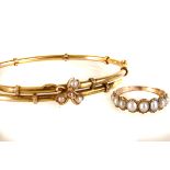 A 9ct gold and seed pearl bangle, together with a gold and eight pearl dress ring (2)