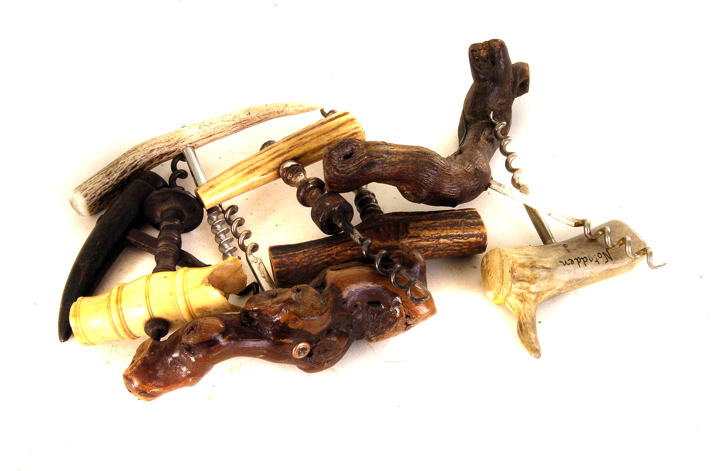 A collection of Cep de vigne, antler and bone handled corkscrews, some with brush ends (parcel)