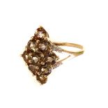 A 9ct gold mystic topaz and diamond dress ring, the nine round cut topaz stones set forming a
