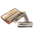 A small selection of various Harmonicas, including Hohner, together with a group of five pens, to