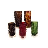 A collection of studio glass by Mdina and Whitefriars, including a green, brown and red bark