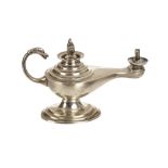 A George VI silver table lighter, in the form of a Roman oil lamp, dated Birmingham 1950