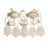 A set of five Silver Jubilee silver spirit labels, bearing the royal coat of arms, plus five of