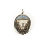 A 19th century mourning pendant, the oval frame with vacant glazed compartment to reverse, the front