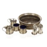 A collection of silver and silver plated items, including a set of silver cruets, a wine bottle