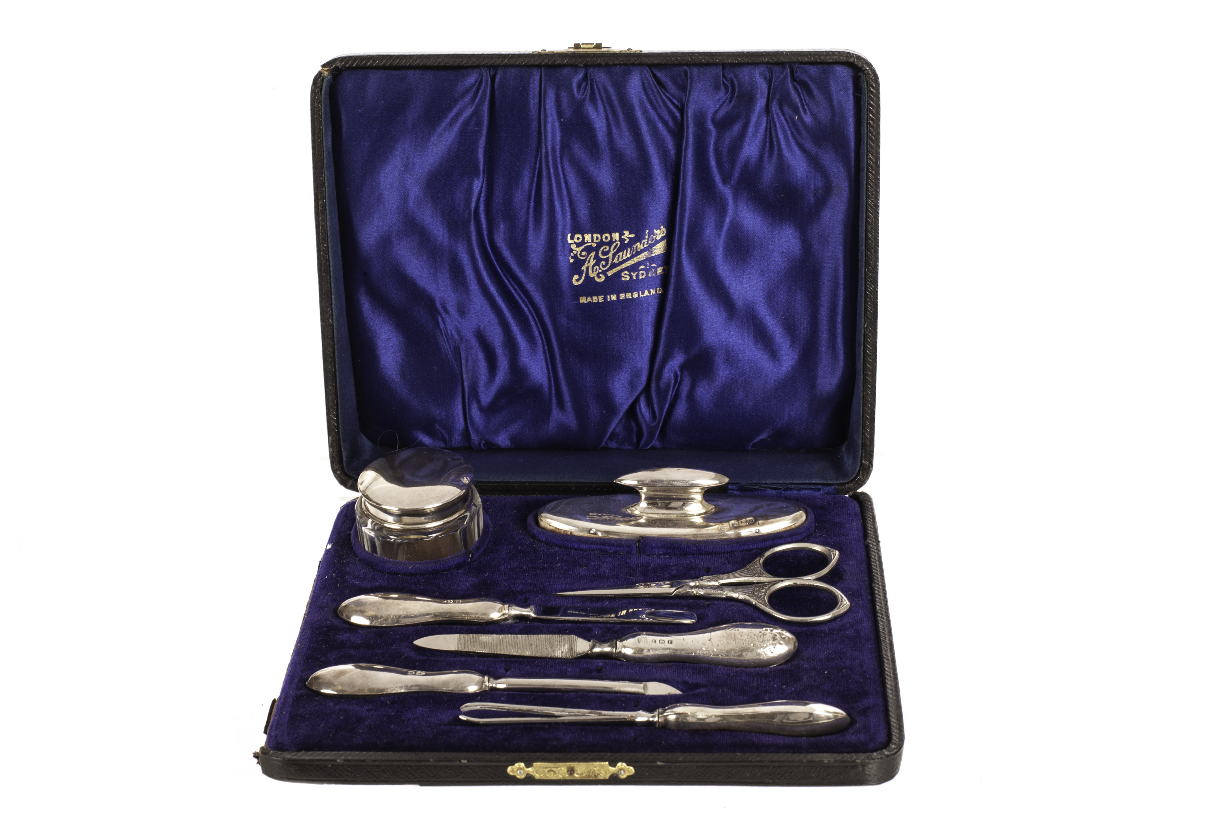 A George V silver cased manicure set, AF
