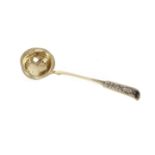 An early 19th century Russian silver gilt and niello sauce ladle, silver marks for Nikolay