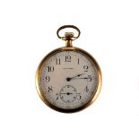 An early 20th century Waltham rolled gold open faced pocket watch, the signed white enamel dial with