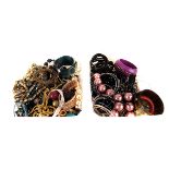 A large assortment of costume jewellery, including, beads, bangles, necklaces, bracelets, and much