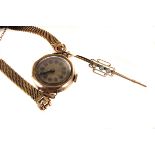 A 1930s 9ct gold cased ladies wristwatch, with Arabic numerals in circular panels, together with a