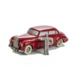 A Prameta Mercedes 300, in red, VG, lacks star, minor retouching with a key, clockwork  tested