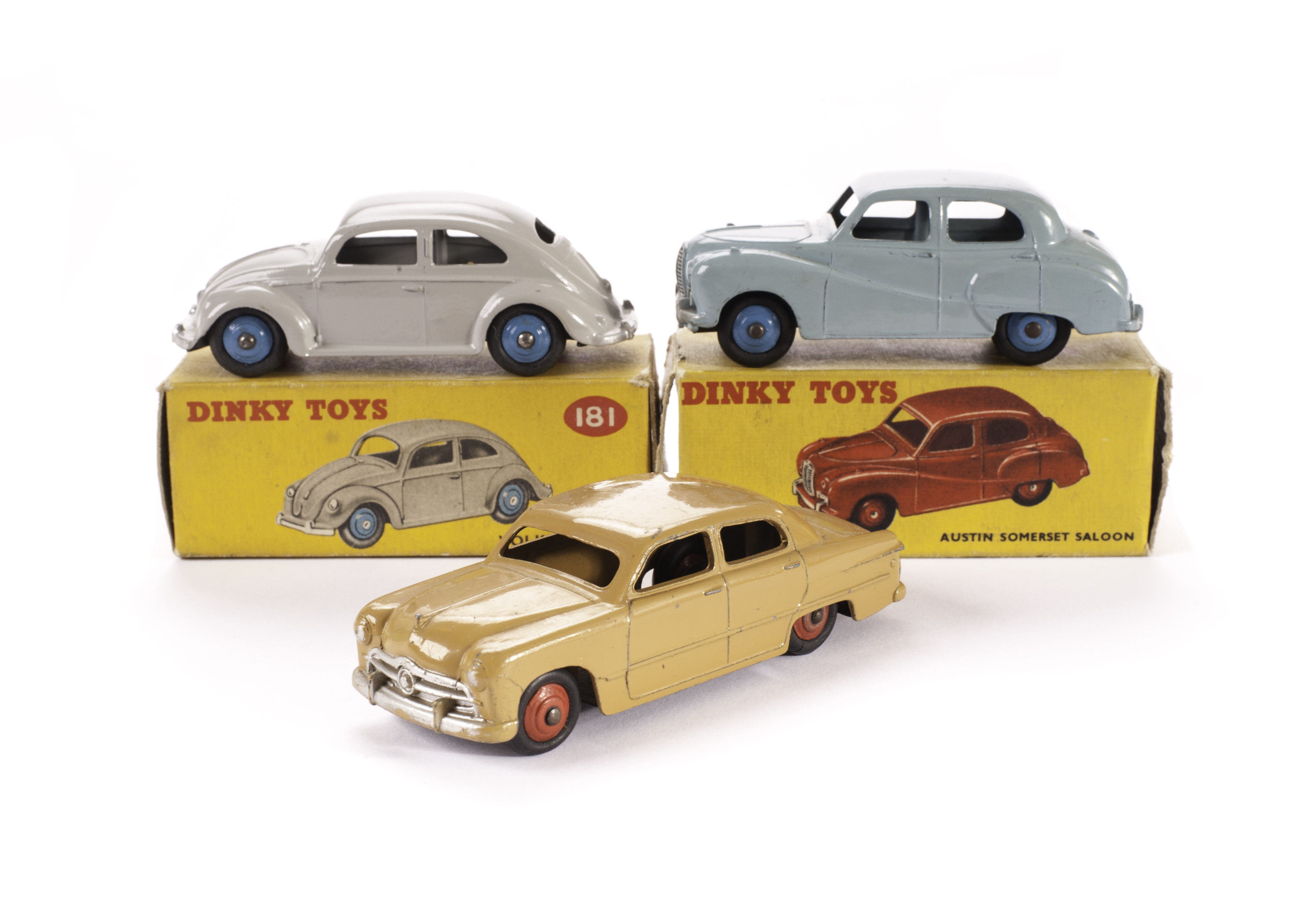 A Dinky Toys 181 Volkswagen Saloon, light grey body, mid blue hubs, 40j Austin Somerset, pale blue