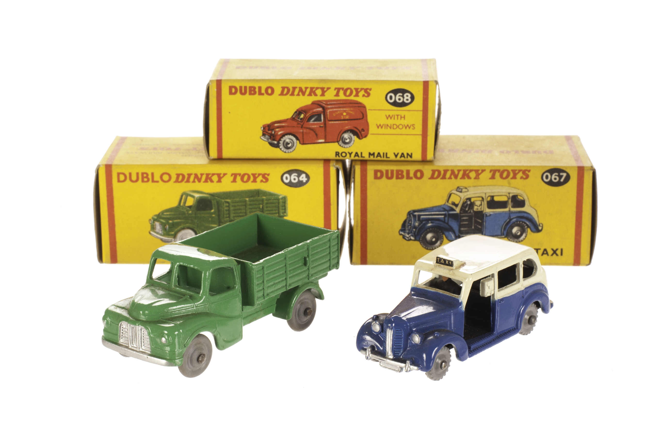 Dublo Dinky Toys 067 Austin Taxi, 064 Austin Lorry, in original boxes with empty 068 Royal Mail