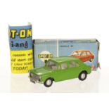 A Tri-ang Spot-On No.262 Morris 1100, bright green body, white interior, in original box with club