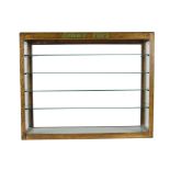 A Dinky Toys Rear Loading Wooden Display Cabinet, wooden framed glass display case with four