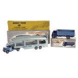 A Dinky Toys 911 Guy 4-Ton Lorry, violet blue cab and chassis, mid-blue back and hubs, 982