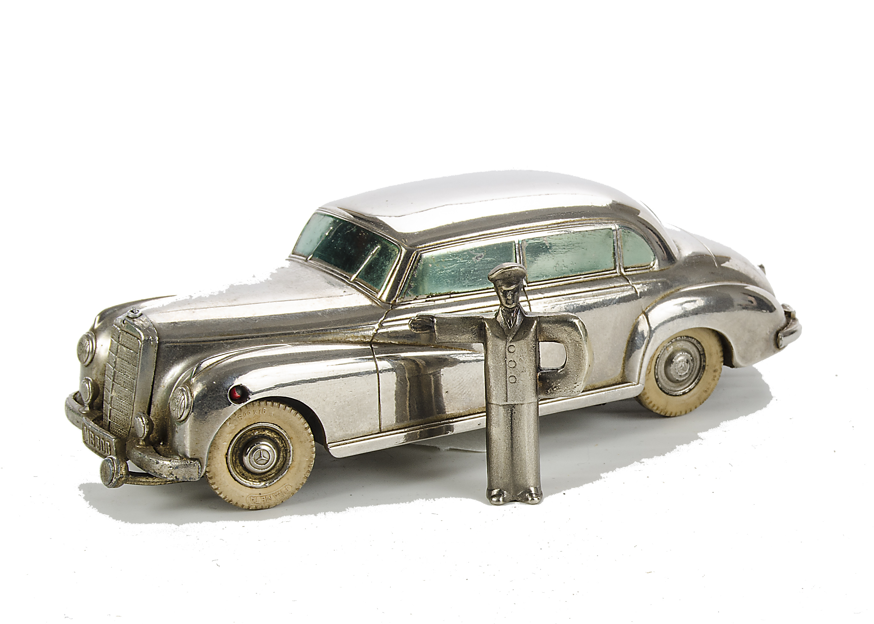 A Prameta  Mercedes 300, in silver, VG, lacks star with a key, clockwork  tested well at time of