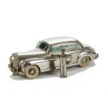 A Prameta  Mercedes 300, in silver, VG, lacks star with a key, clockwork  tested well at time of