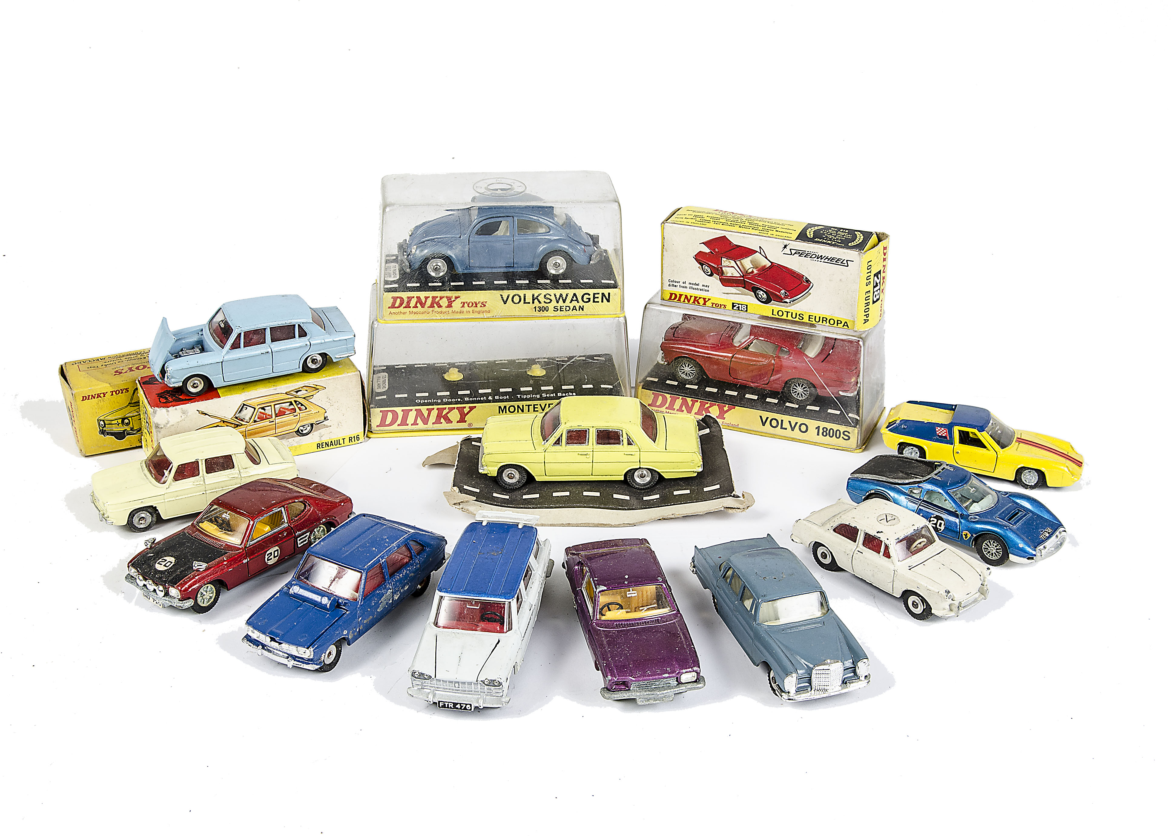 A Dinky Toys 129 Volkswagen 1300 Sedan, metallic blue body, spun hubs, 116 Volvo 1800S, French 517