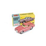 A Corgi Toys 228 Volvo P.1800, pink body, lemon interior, in original box, E, box F, lacks end flap