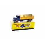A Dinky Toys 417 Leyland Comet Lorry, violet blue cab and chassis, dark yellow back, red hubs, in