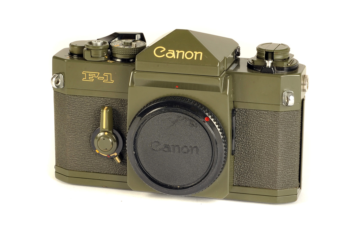 A Canon F-1 Olive SLR Body, ‘ODF-1’ Olive drab, serial no. 577061, body, VG, with maker’s case and