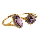 Two 9ct gold and gem set dress rings, both cluster style rings having purple cut stones (2)