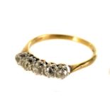 A five stone diamond ring, the brilliants totalling approx .4 carat, shank stamped '18ct plat',