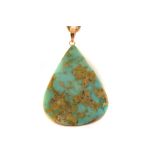 A 9ct gold chain necklace with turquoise pendant, the large polished teardrop shaped piece of