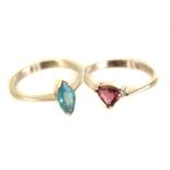 Two 9ct gold solitaire gem set rings, both in white 9ct, one with a pink triangular stone the