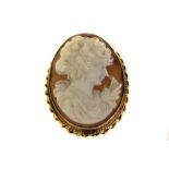 A 9ct gold mounted cameo brooch cum pendant, having a relief carved bust of a young lady in