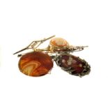 A group of antique and vintage brooches, including a 9ct gold and cameo example, a large agate