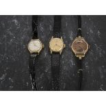 Three lady’s 9ct gold wristwatches, including Tissot, and Omega examples, also an unnamed early to