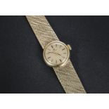 A 1970s 9ct gold Omega lady’s wristwatch, circular case on mesh 9ct gold bracelet, together with