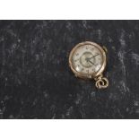 An Art Deco 9ct gold lady’s fob watch, converted from a wristwatch and now with bale and link,