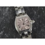 A modern stainless steel Cartier Roadster lady’s wristwatch, having pink dial with Roman numerals