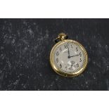 An Art Deco period gold plated open faced pocket watch by Waltham, having silvered dial with