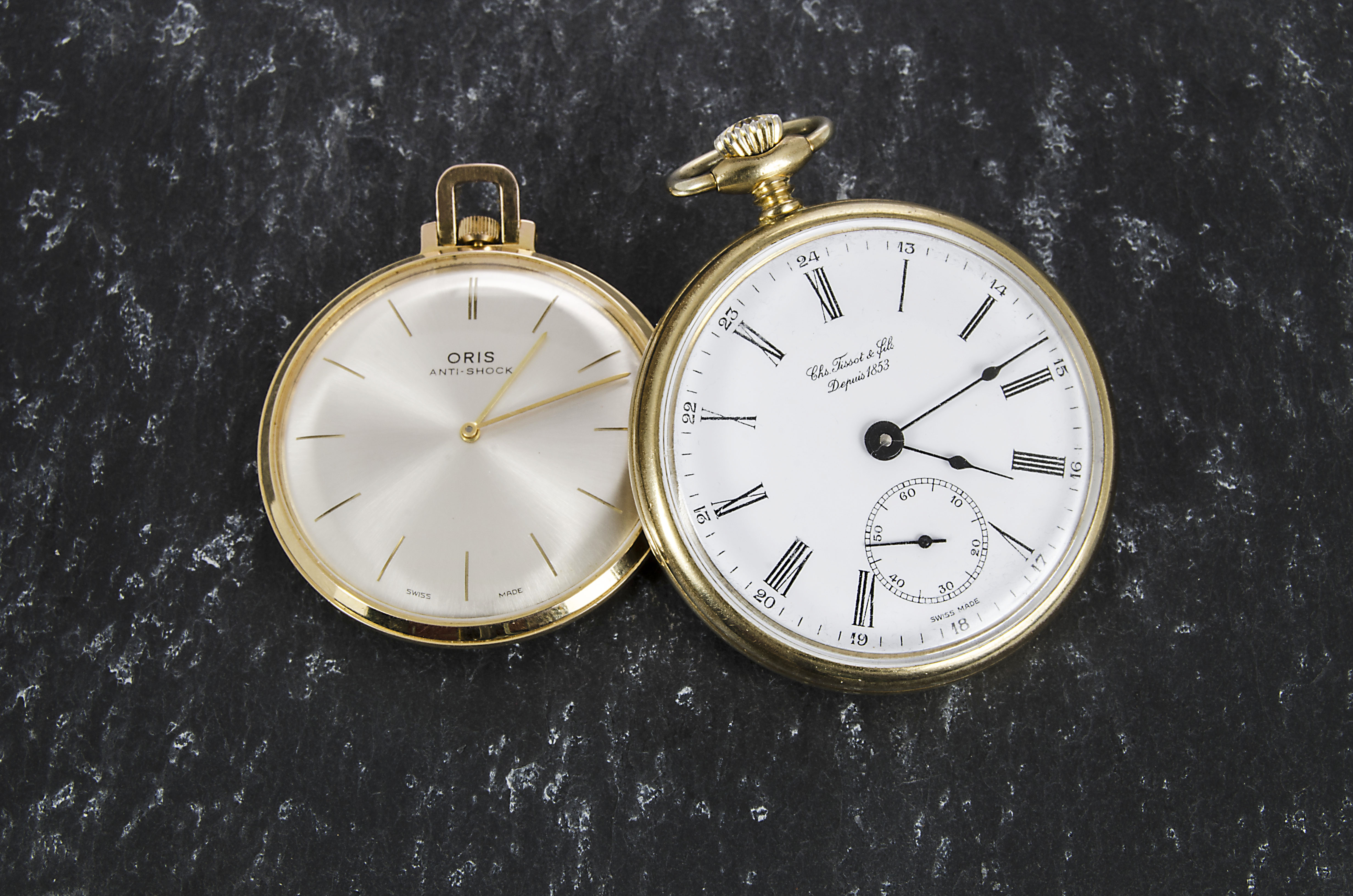 A gold plated open faced pocket watch by Tissot, marked to dial, together with an Oris open faced