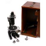 A Swift & Sons Microscope, with various objectives, in maker's case