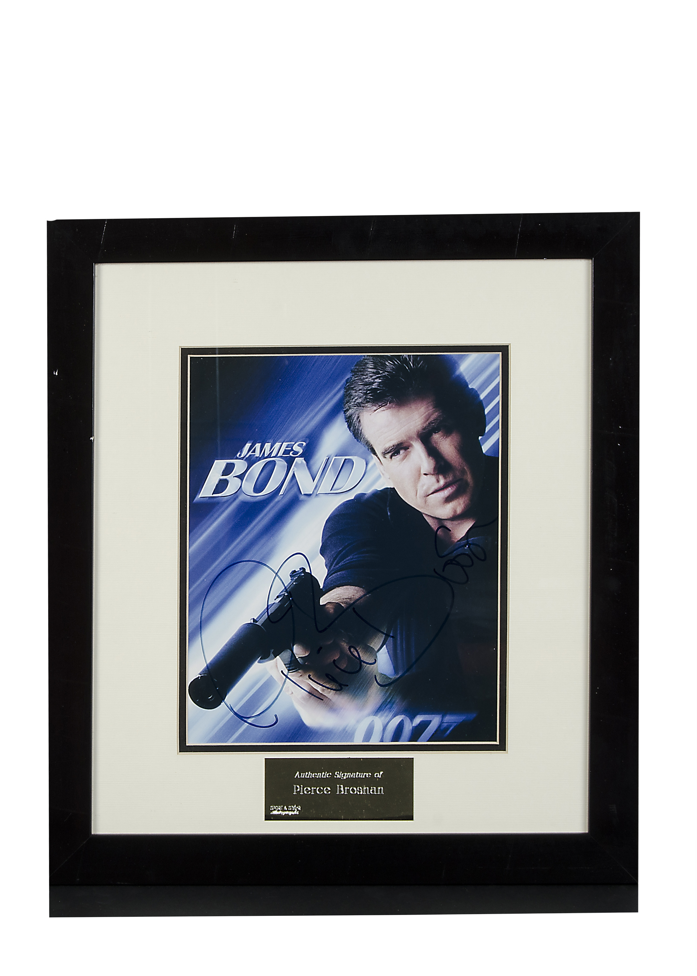 James Bond / Pierce Brosnan Autograph: Framed and glazed colour print signed Pierce Brosnan, with
