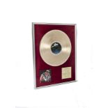 Judas Priest: An original gold album award presented to drummer Dave Holland for the Epic / Sony INC