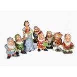 Snow White And The Seven Dwarves: A set of vintage hand painted terracotta figures, dwarves,