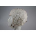 Brooklands - An original race-worn wind-cap helmet c1920s: A rare aviator-pattern white cloth helmet