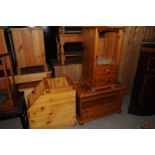A pine stereo cabinet, a pine corner table, and a pine TV cabinet (3)