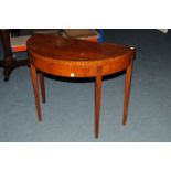 A George VI sapele mahogany folding card table, possibly officer's mess, crown and cipher beneath