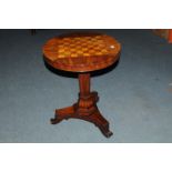 A William IV or early Victorian mahogany and inlaid chess occasional table, having circular top on