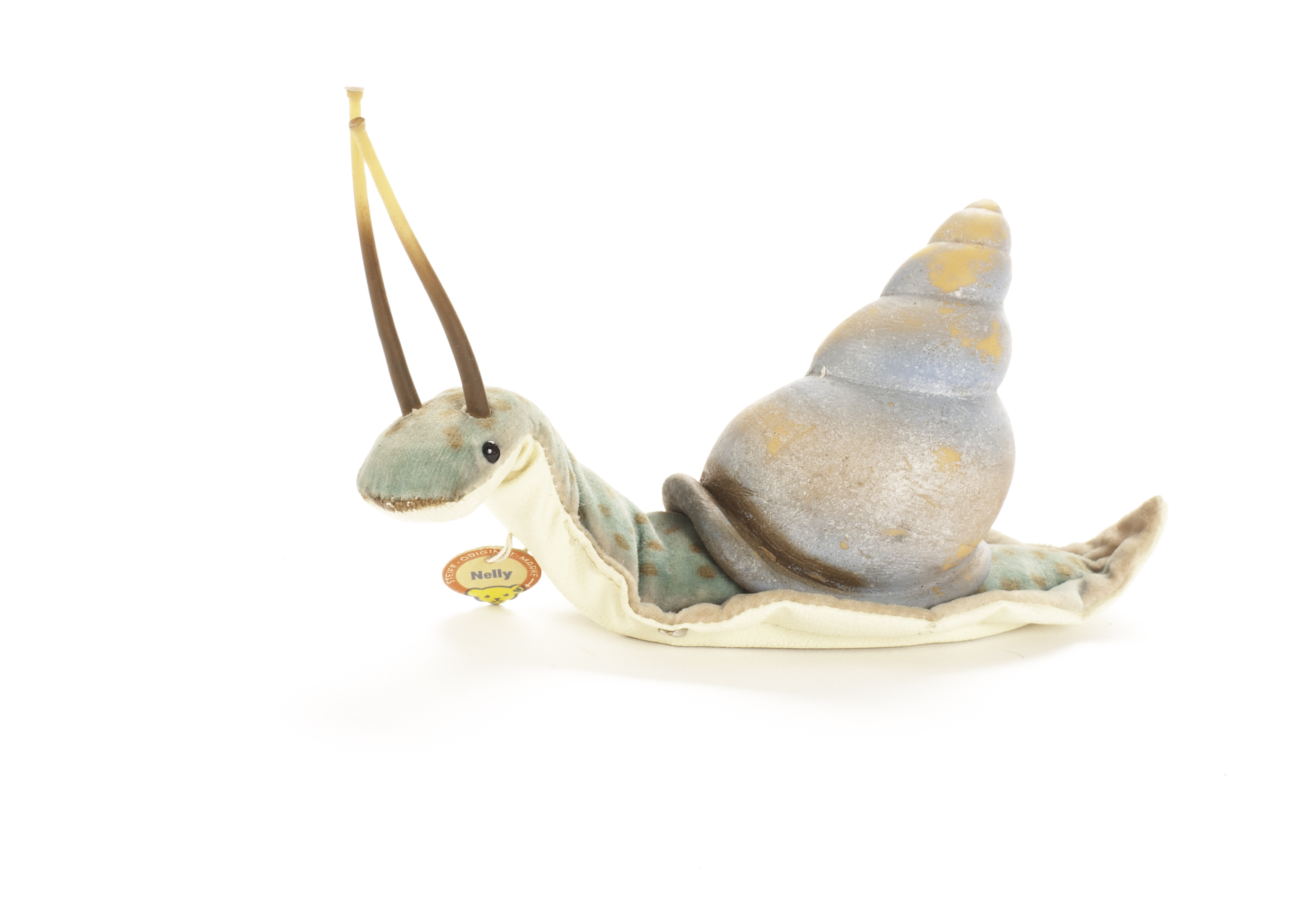 A rare Steiff Nelly Snail, 1961-63, with turquoise spotted velvet body, vinyl shell and antennae,