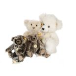 Four yellow tagged Steiff Teddy Bears: three jointed Classic bears; and one unjointed soft stuffed